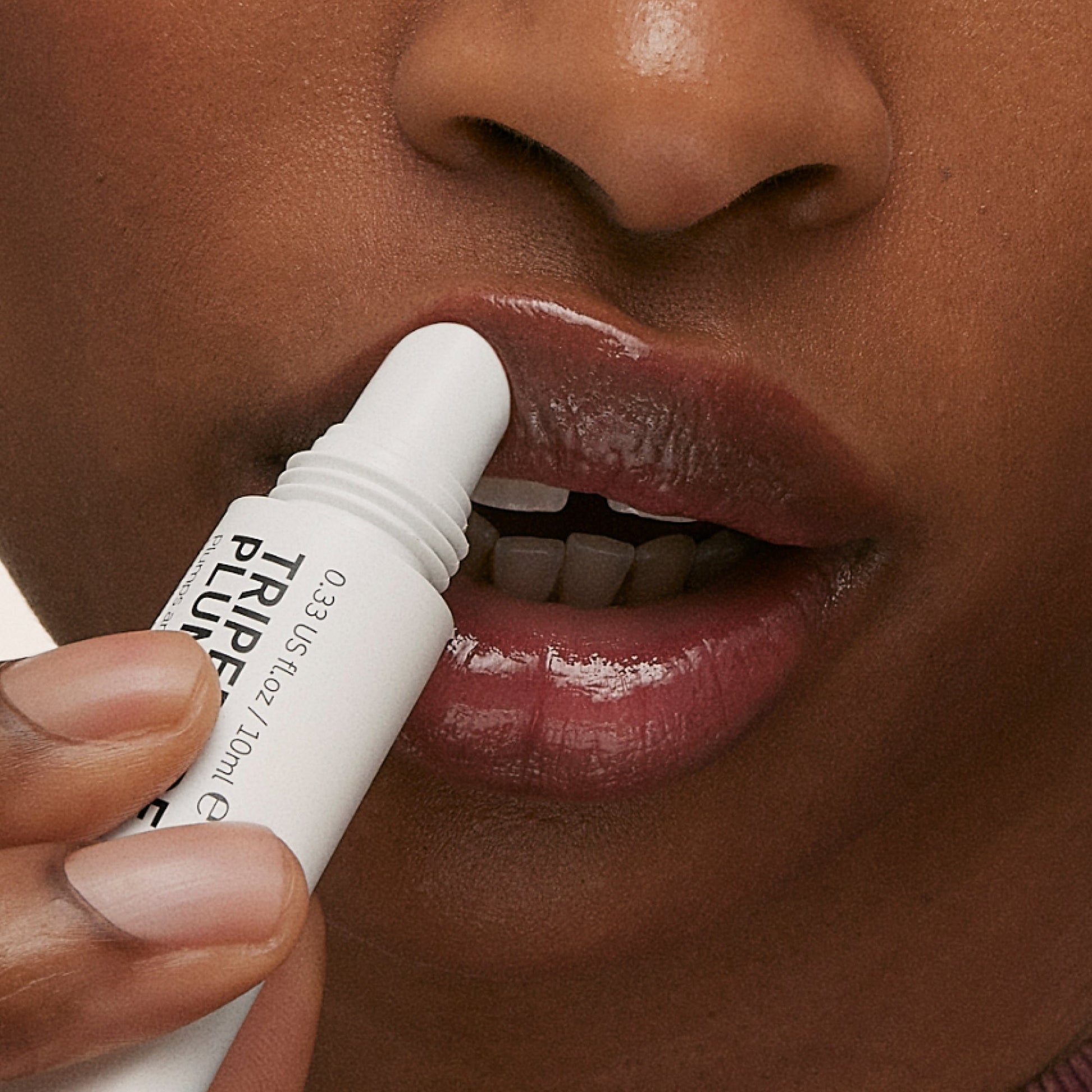 tripeptide-plumping-berry-lip-balm-c8 ApplicationBerry.jpg
